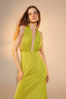 Green glow maxi dress by Nazlı Ceren featuring a long, flowing jersey design with elegant style and comfortable fit.
