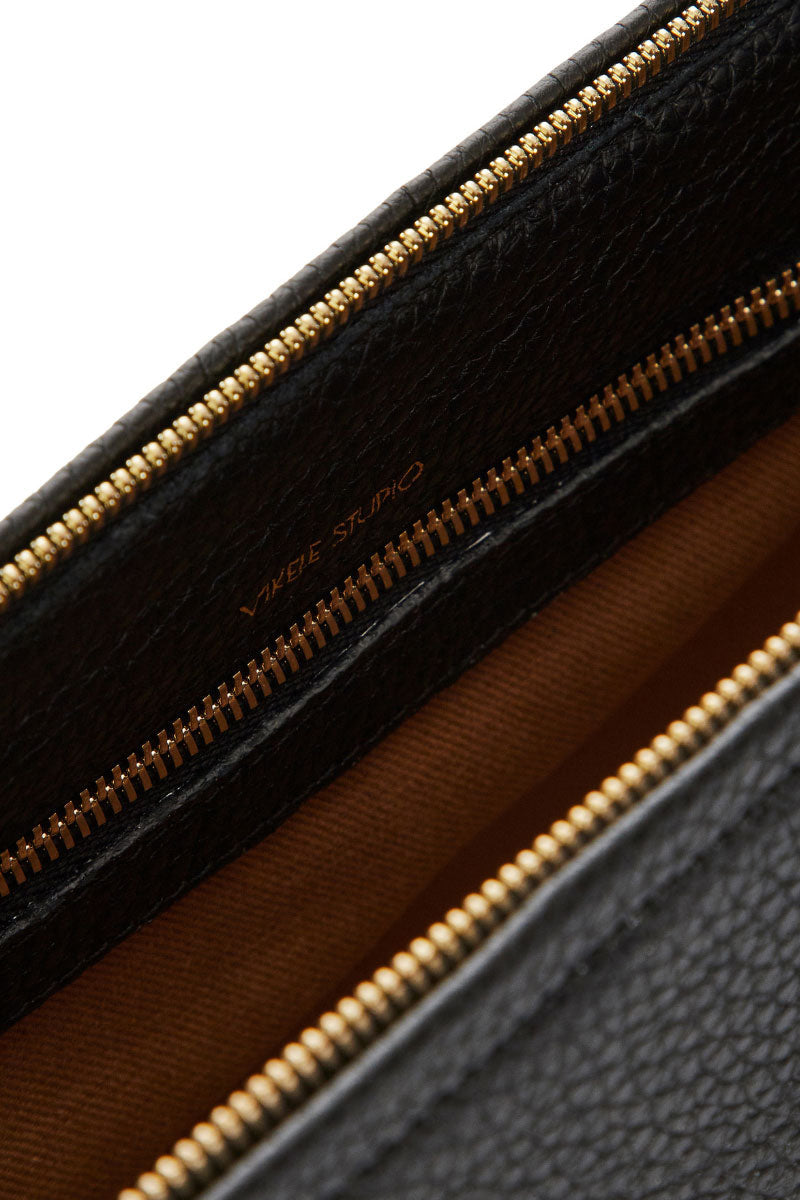 Black VIKELE STUDIO Denise mini shoulder bag with sleek design and compact size, perfect for casual or evening wear.