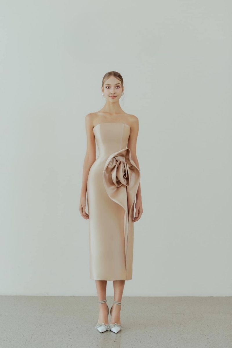 HACCHIC COUTURE Rosie Gold Pencil Midi Dress displayed on a mannequin, featuring a fitted silhouette and elegant gold fabric.