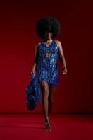 Blue Onalaja Zari shoulder bag with intricate woven design, featuring a stylish handle and elegant craftsmanship.
