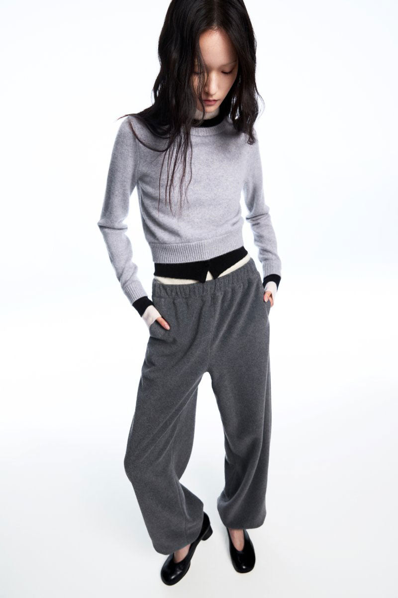Chictopia layered grey cashmere sweater with a soft, cozy knit, styled with a relaxed fit and modern design.