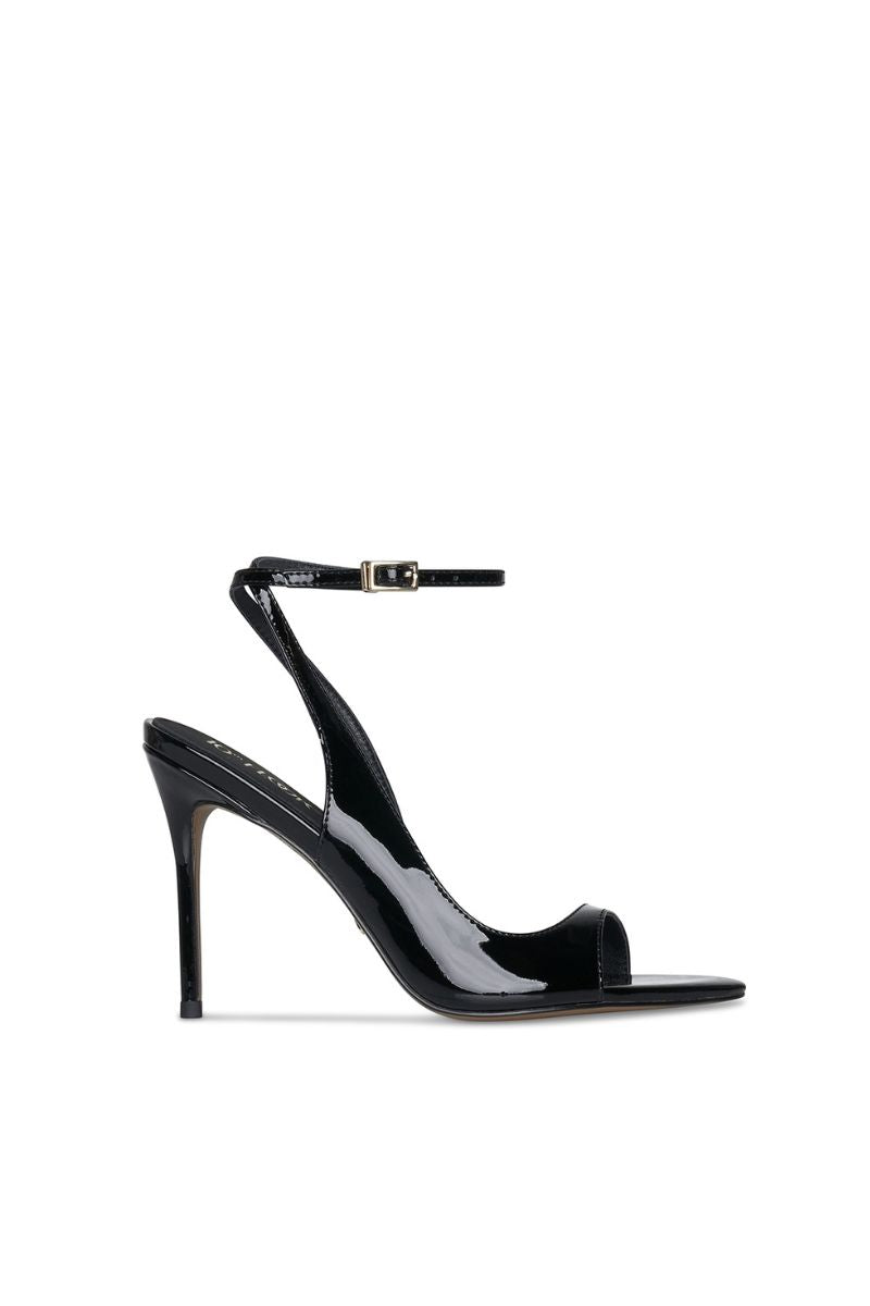 Black 10th Floor Midnights Heels featuring a sleek design with pointed toes and stiletto heels, perfect for elegant occasions.
