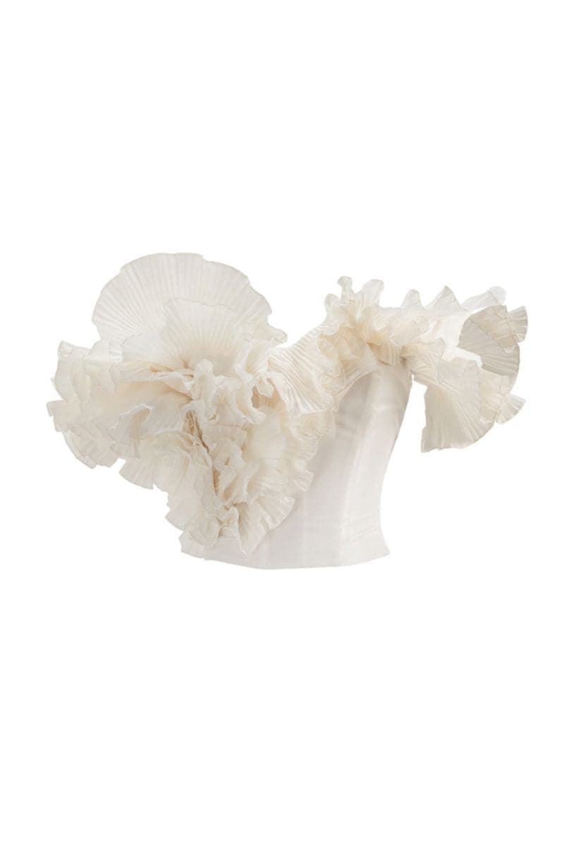 White plissé corset top by Monetre featuring a fitted design and elegant pleated fabric, perfect for stylish layered looks.