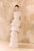 Elegant EMALY gown by Arti Apparel featuring intricate lace details and a flowing silhouette, perfect for formal occasions.