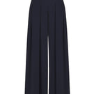 Black Sufia pants by Mastani featuring a relaxed fit and stylish design, shown on a model.