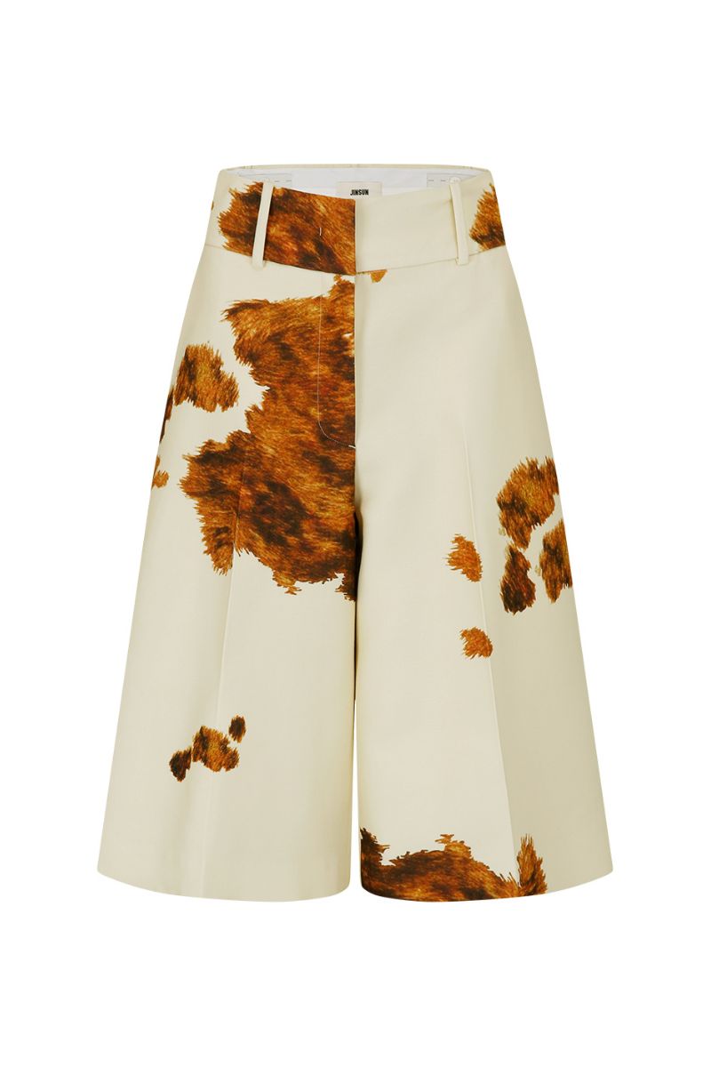 JINSUN printed wool silk Bermuda shorts in pale yellow, featuring a tailored fit and smooth fabric detail.