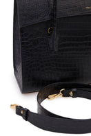 Black CELINE shoulder bag by VIKELE STUDIO, featuring a sleek design with a structured shape and stylish handle.