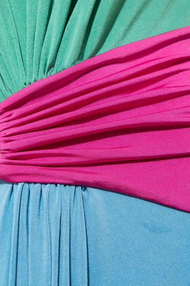 Sisters Leila maxi dress in soft pastel colors, flowing fabric, and elegant design, perfect for a stylish summer look.