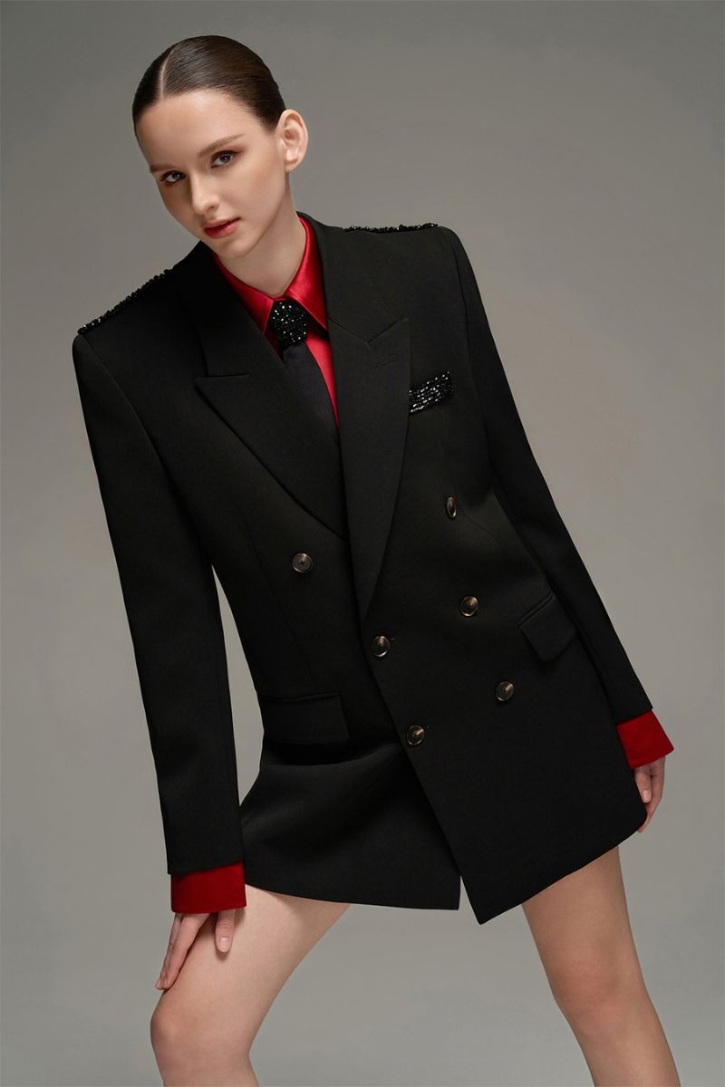 Black oversized double-breasted blazer by I.H.F Studio, shown on a hanger with a tailored fit and classic lapel design.