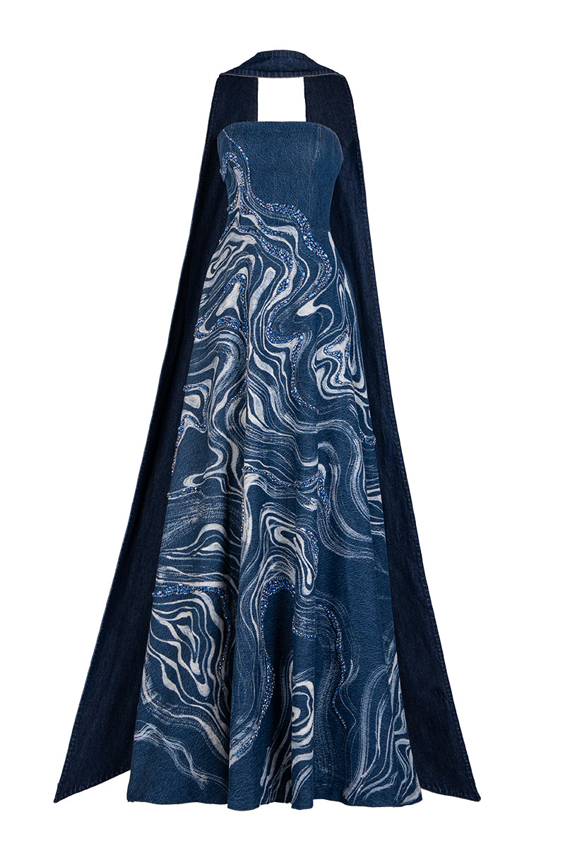 Blue strapless gown with crystal-embroidered marblewood detail from GVLUX, featuring elegant flowing fabric and intricate embellishments.
