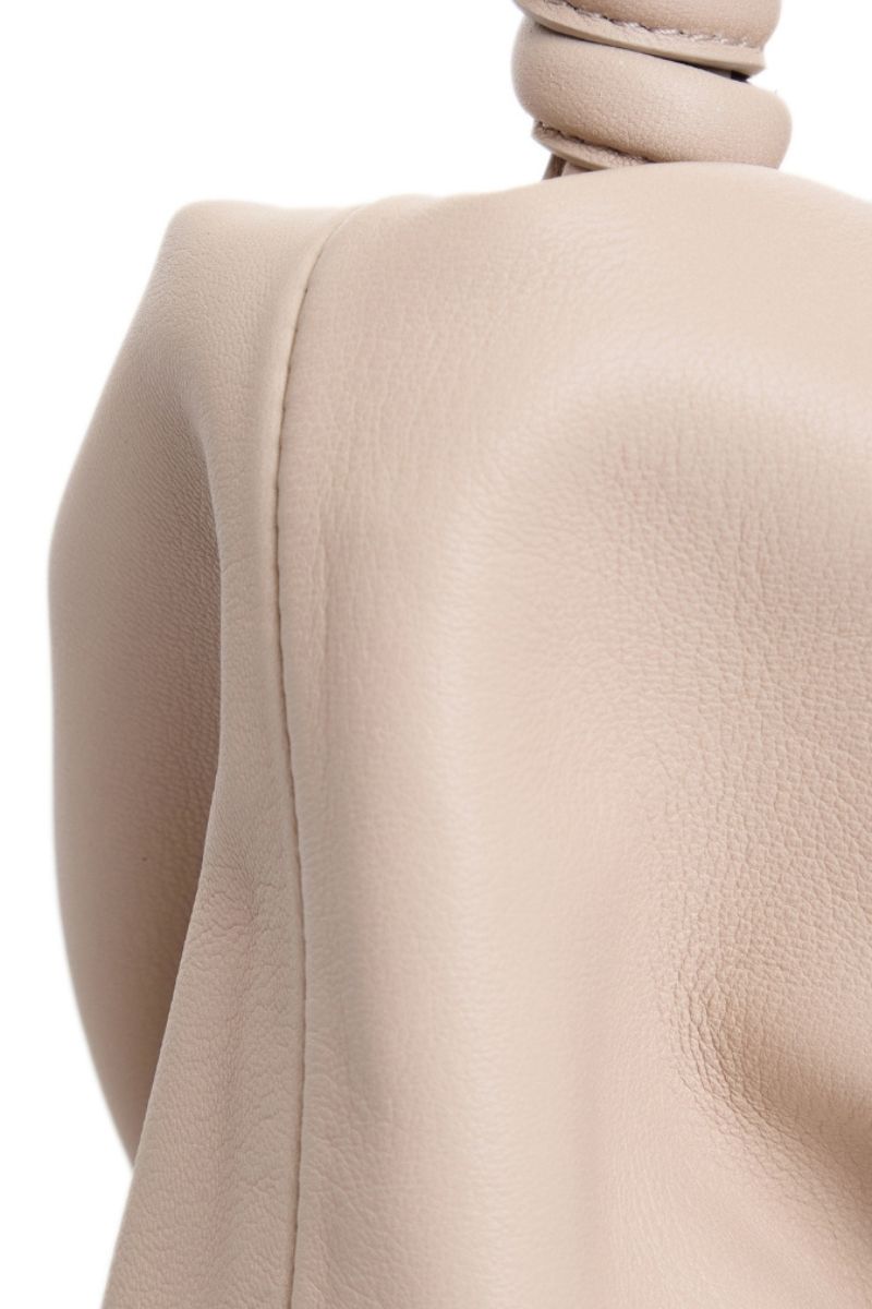 Beige VIKELE STUDIO Rosie shoulder bag with sleek design and adjustable strap, displayed on a neutral background.
