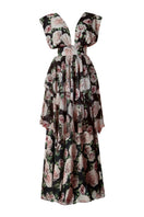 Nur Karaata Beatrice Maxi Dress shown in flowing fabric with elegant design and vibrant pattern, perfect for summer or formal occasions.