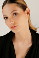 Gold 5 stones stud earrings by Fenomena featuring five sparkling gemstone accents on classic post earrings.