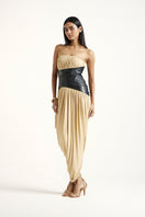 Deme By Gabriella Erin Gold Maxi Dress displayed on a mannequin, featuring elegant flowing fabric and a stylish neckline.