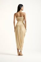 Deme By Gabriella Erin Gold Maxi Dress with elegant flowy fabric and sleeveless design, suitable for formal occasions.