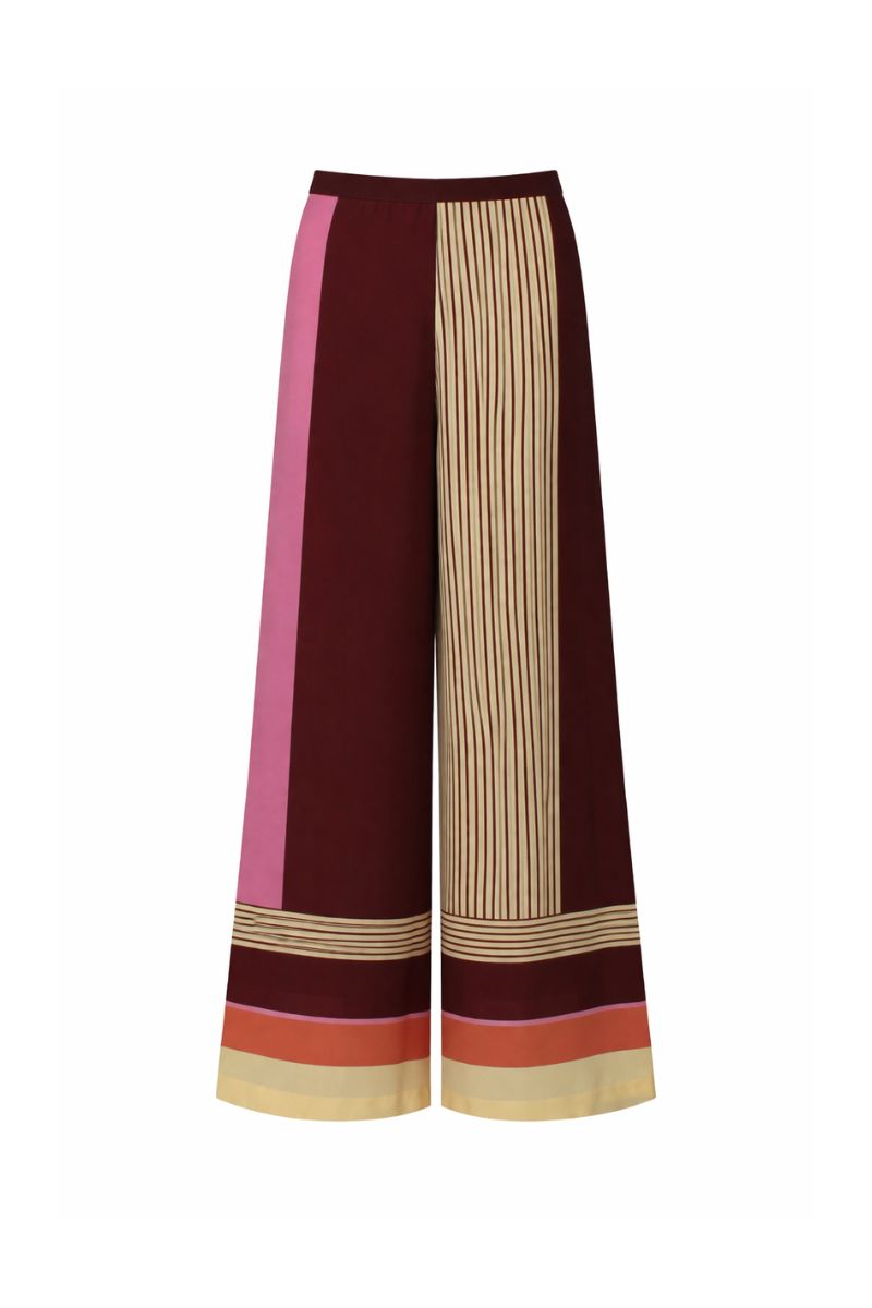 Baobab NOA pants in terracotta rosata color, stylish and comfortable casual pants with a relaxed fit and tapered legs.
