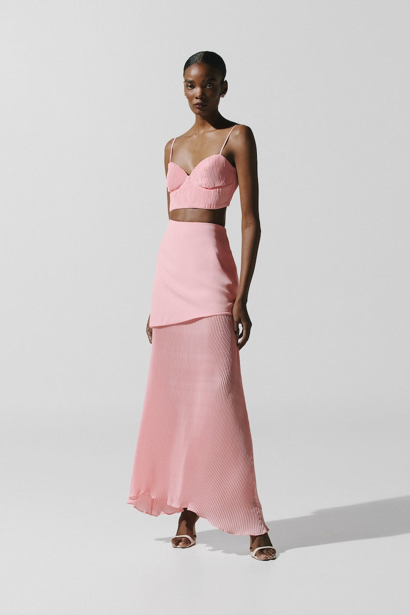 Baobab Roma crop top in Rosa Spritz with a fitted design and short sleeves, featuring a vibrant pink color and stylish neckline.
