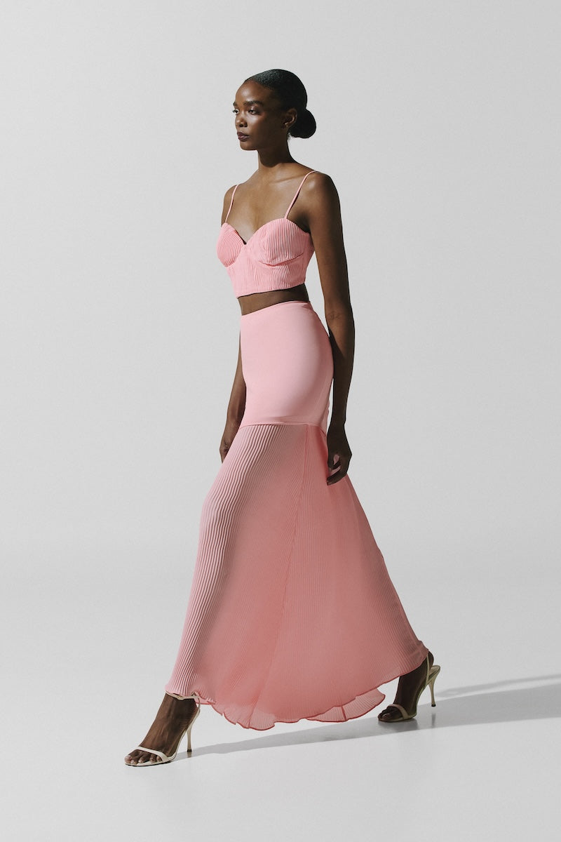 Baobab Roma crop top in Rosa Spritz color, featuring a stylish, fitted design with short sleeves and a round neckline.