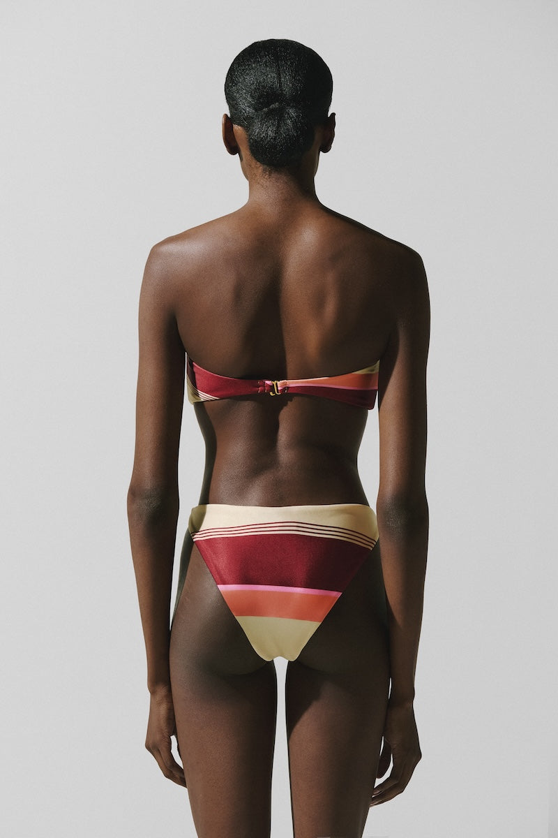 Baobab ZUR bikini bottom in terracotta rosata, stylish swimwear with a flattering fit, shown on a model.