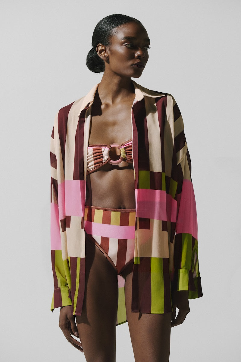 Baobab Lulu shirt in Oliva Rose, lightweight cotton shirt with long sleeves and a relaxed fit, displayed on a hanger.