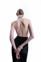 LEDIEL NABY black gown, elegant evening dress with a flowing silhouette and subtle detailing, suitable for formal occasions.