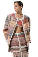 Lalo Avril maxi skirt in red multi with flowing fabric and vibrant pattern, displayed on a hanger against a plain background.