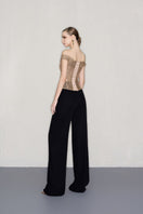 Gold hand-embellished CEM top with intricate detailing, featuring a stylish and elegant design ideal for fashionable tops.