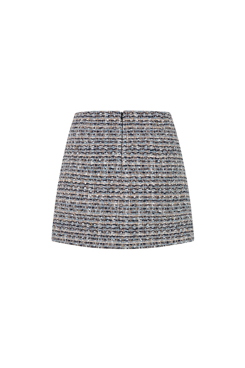 Multicolor tweed mini skirt by Valenciani featuring a classic, textured design and a stylish, fitted silhouette.