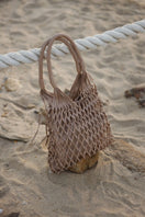 Adriana Castro nude leather shoulder bag from La Red Leather collection, showcasing soft leather and elegant design.