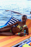 Baobab Zoe bikini bottom in Limonata color, bright yellow swimwear with side ties, suitable for beach or pool outings.