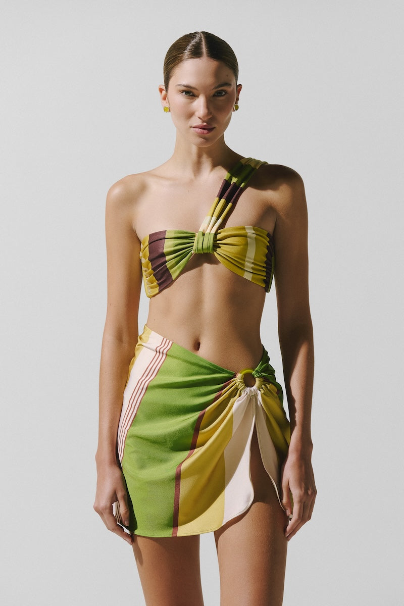 Baobab NERANO mini skirt in Limonata color, shown in a close-up image highlighting the fabric and stylish design.