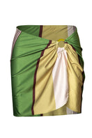 Baobab NERANO mini skirt in Limonata color, featuring a vibrant yellow design, displayed on a hanger against a white background.