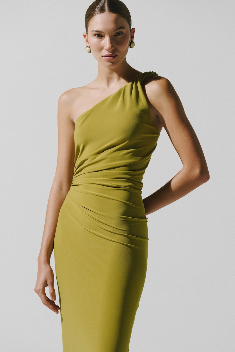 Baobab CELELE maxi dress in Limoncello color, flowing fabric and elegant design, displayed on a hanger.