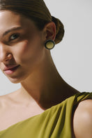 Baobab Celéle maxi dress in Limoncello color, flowing fabric, sleeveless design, and elegant silhouette on a model.