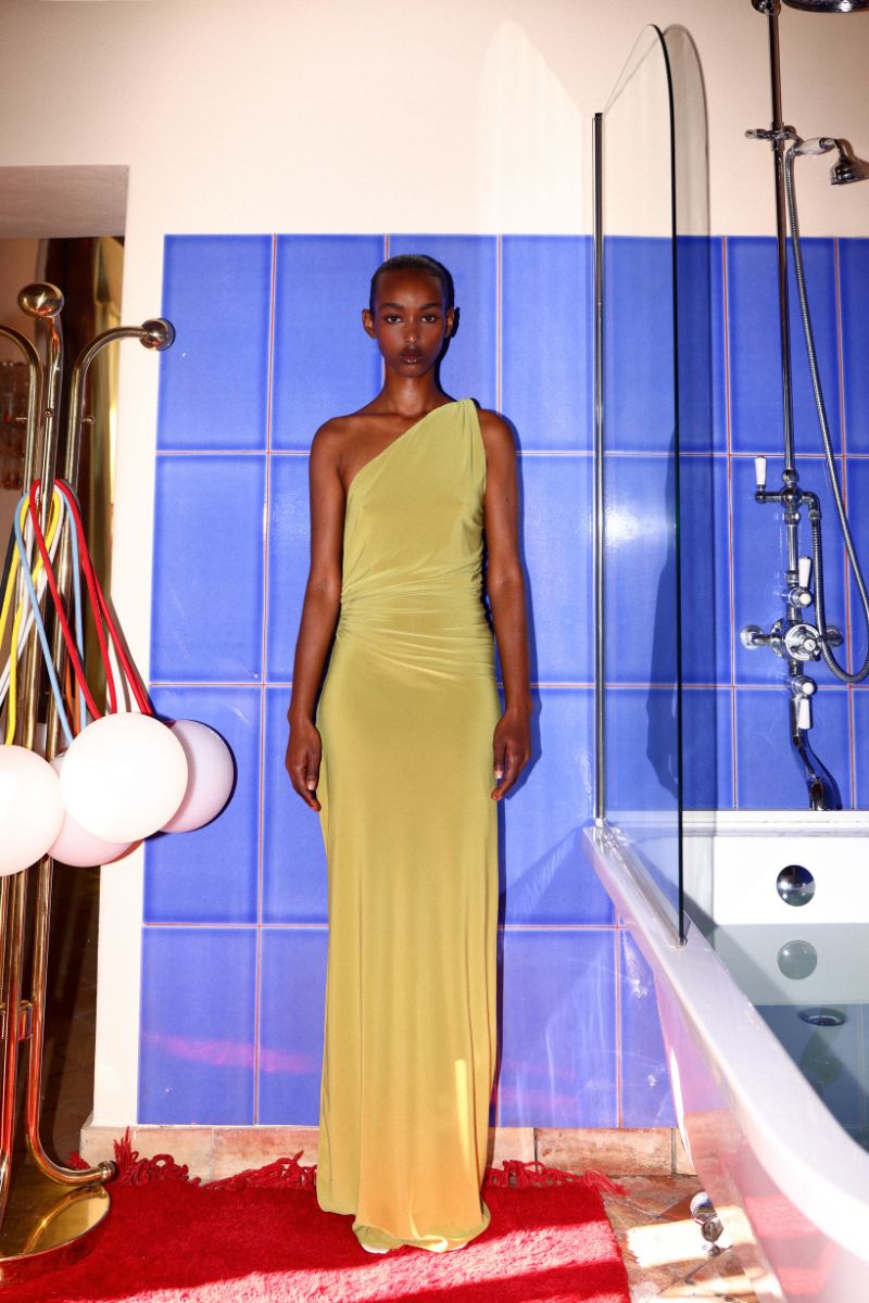 Baobab Celéle maxi dress in limoncello color, flowing design with spaghetti straps, lightweight fabric, perfect for summer wear.