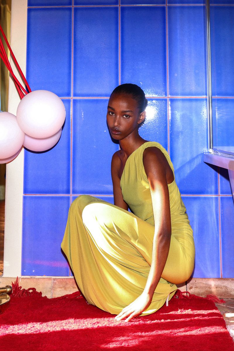 Baobab Celéle maxi dress in limoncello color with flowing fabric and sleeveless design, perfect for summer wear.