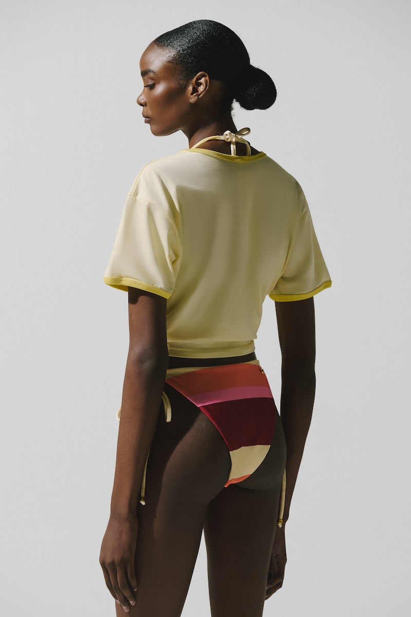 Light beige Baobab TIKA T-shirt in Crema Italiana with a casual fit, displayed on a white background.