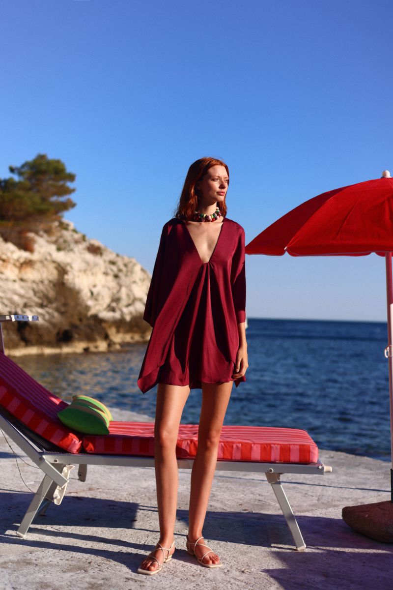 Baobab Pietro Mini Dress in Amarena color, showcasing a stylish, fitted mini dress with elegant design details.