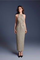 Keira Tong gold checkered cut-out midi dress displayed on a hanger, showcasing its stylish pattern and modern design.