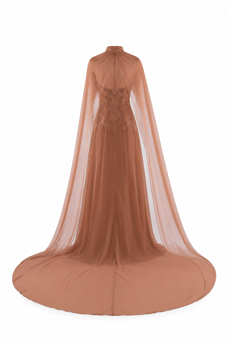 HACCHIC COUTURE Aurora Cape Gown in cinnamon rose, a flowing maxi dress with cape detail, elegant and vibrant for special occasions.