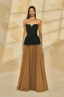L'SCARLETT off-shoulder fringe jacquard and chiffon flared gown with flowing fabric and elegant design.