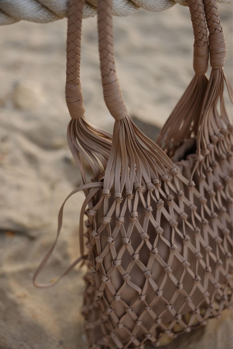 Adriana Castro nude leather shoulder bag from LA RED LEATHER collection, featuring soft textured leather and sleek design.
