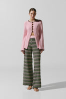 Baobab Corsica Top in Vita Rosa, stylish women's sleeveless blouse with a flowy design and vibrant pink color.