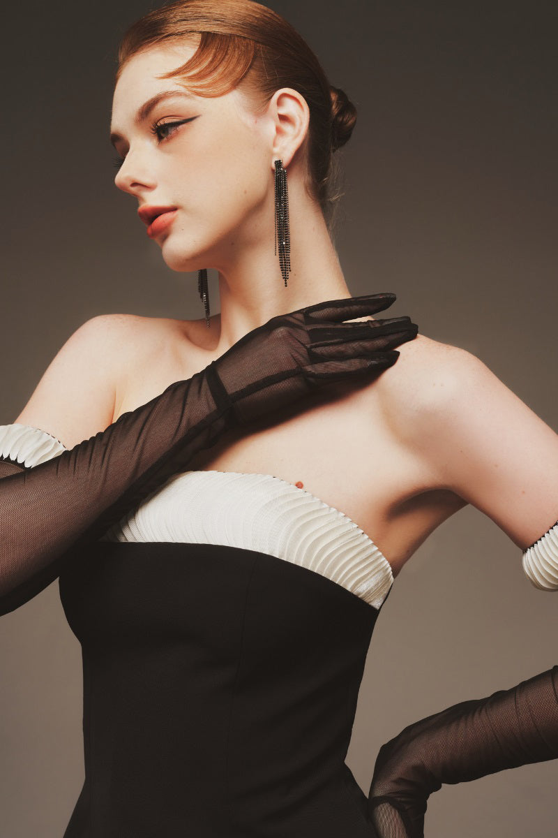 Elegant Margée Atelier Vesper Evening Gown maxi dress with flowing fabric and sophisticated design, perfect for formal occasions.
