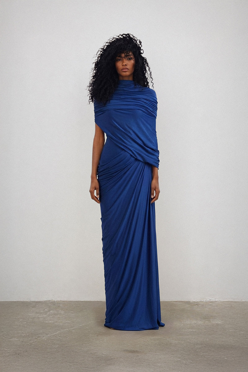 Deme By Gabriella ESTRADO gown with elegant flowing fabric and intricate detailing, perfect for formal occasions.