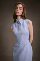 Pastel blue sleeveless maxi dress by Keira Tong, flowing fabric and relaxed fit perfect for warm weather.