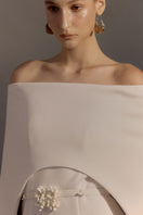 White Plan Legacy Dress gown with elegant design, flowing fabric, and intricate detailing, perfect for formal occasions.
