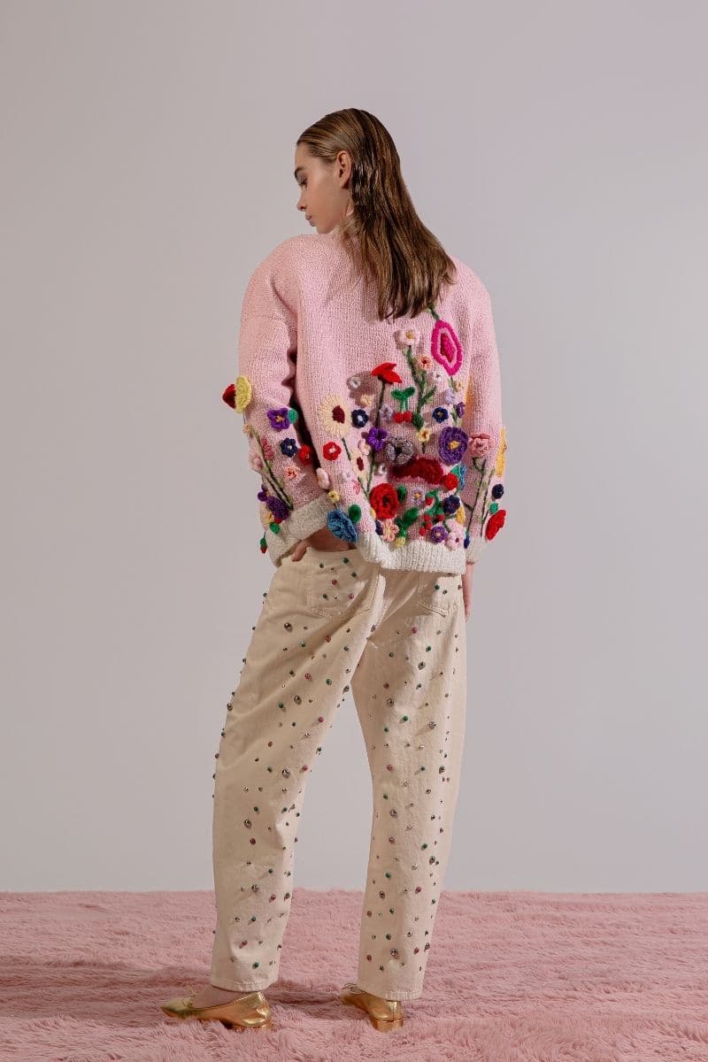 Lalo Floris pink embroidered oversized cardigan with floral embroidery, showcasing its cozy knit fabric and relaxed fit.