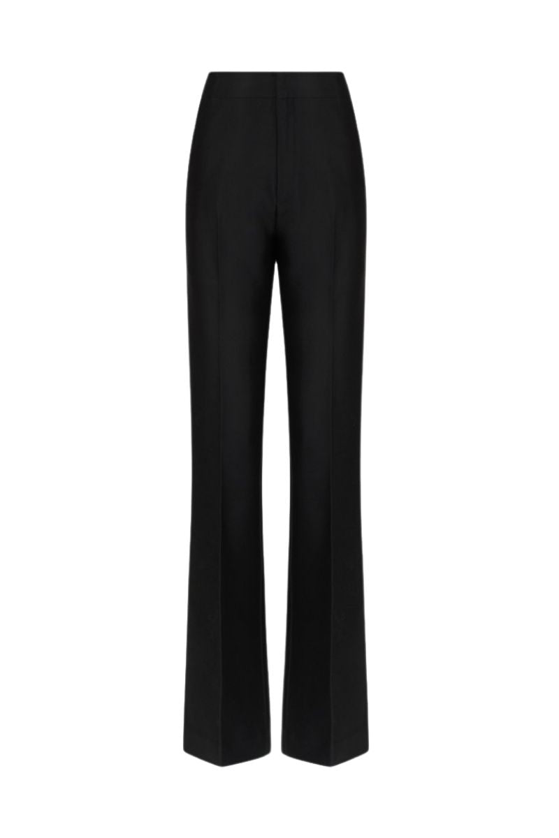 LEKIEU Martine black straight ribbed pants displayed on a model, showcasing a sleek, fitted design and ribbed fabric texture.