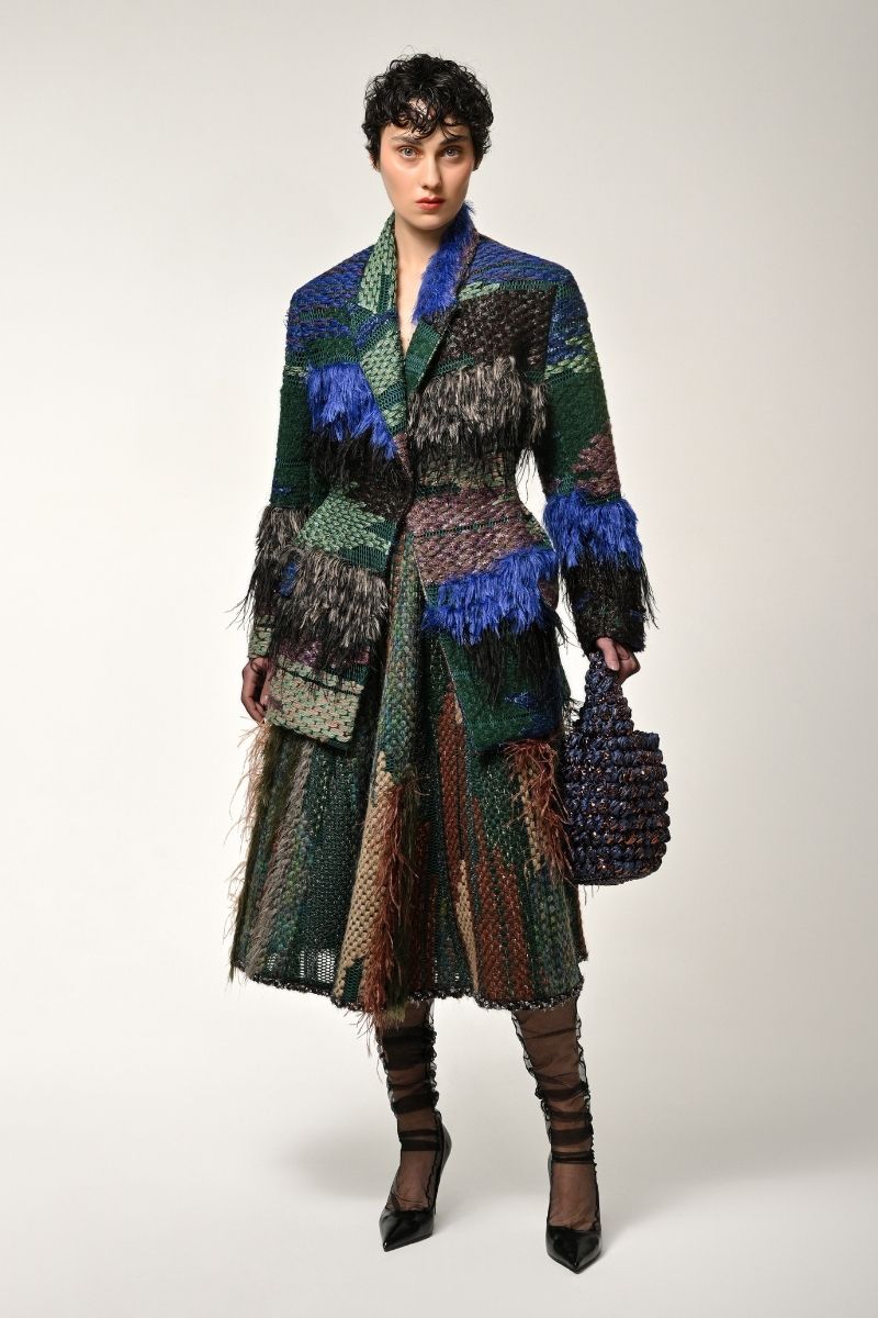 Lalo feather jacket in multi-color with a stylish, layered design and feather detailing, perfect for a fashionable outdoor look.